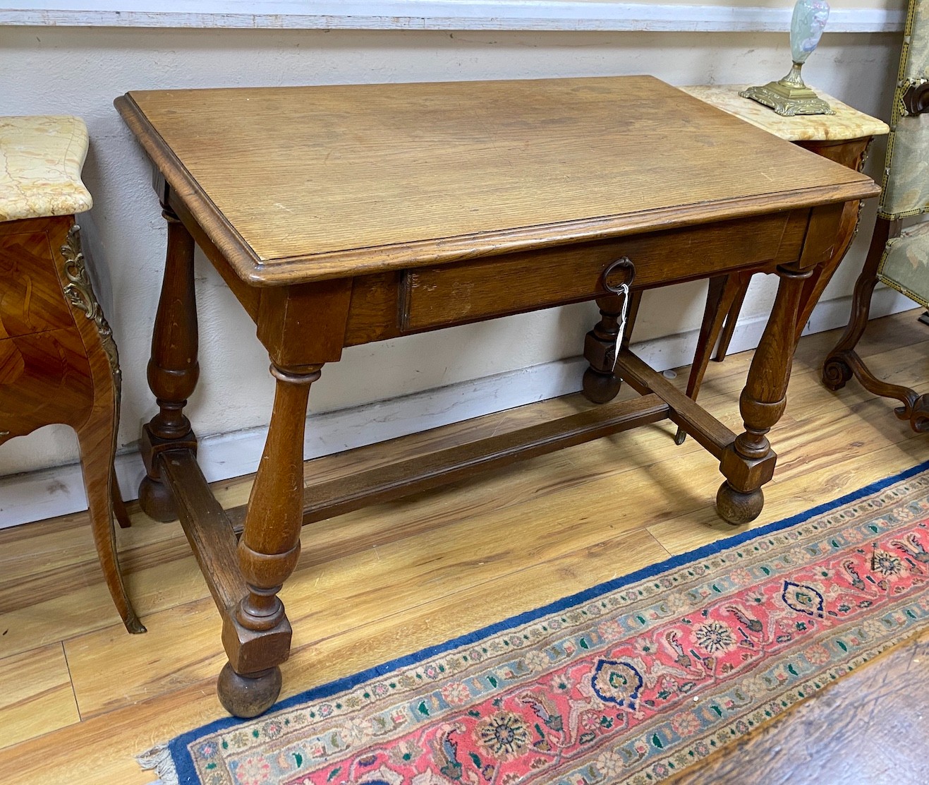 An early 20th century oak side table, width 100cm, depth 58cm, height 75cm